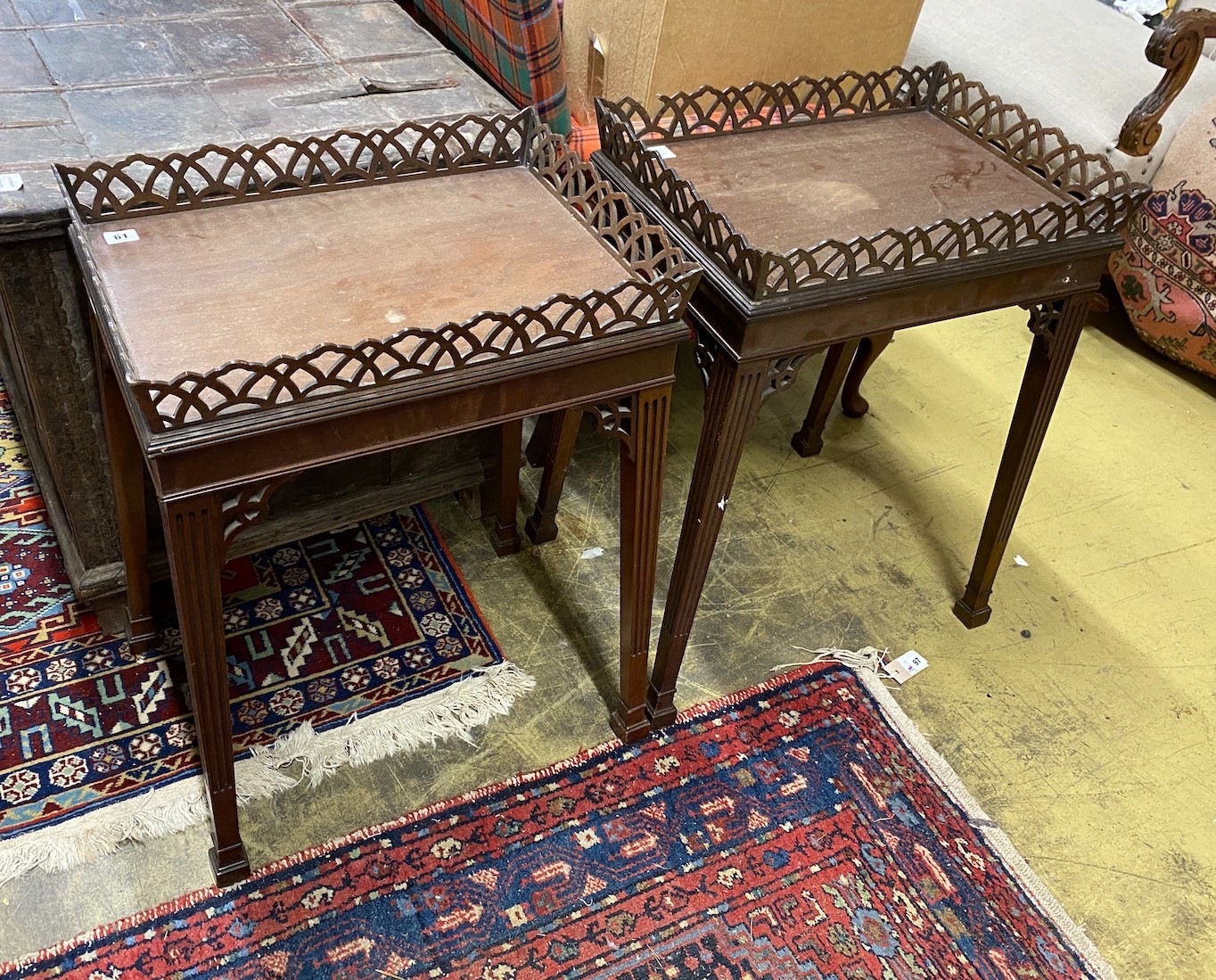A pair of George III style rectangular mahogany fret cut occasional tables, width 54cm, depth 39cm, height 74cm